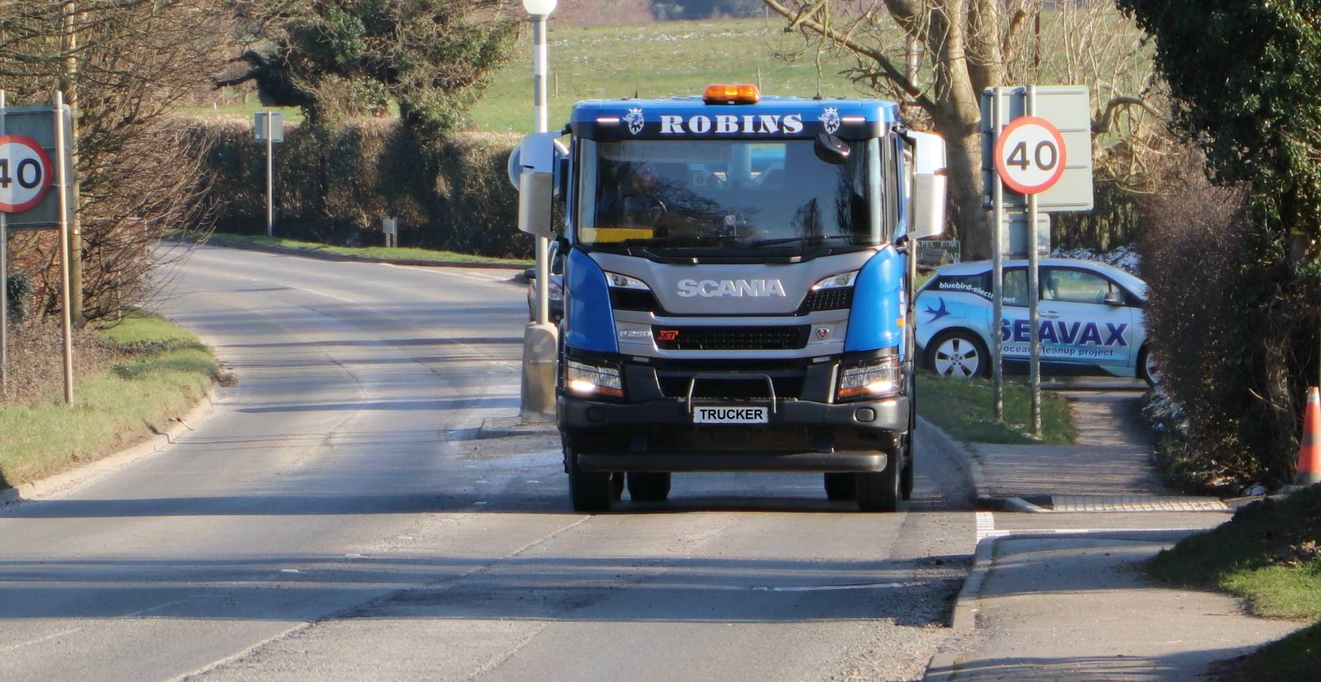 Large trucks frequently travel this busy A road causing massive potholes